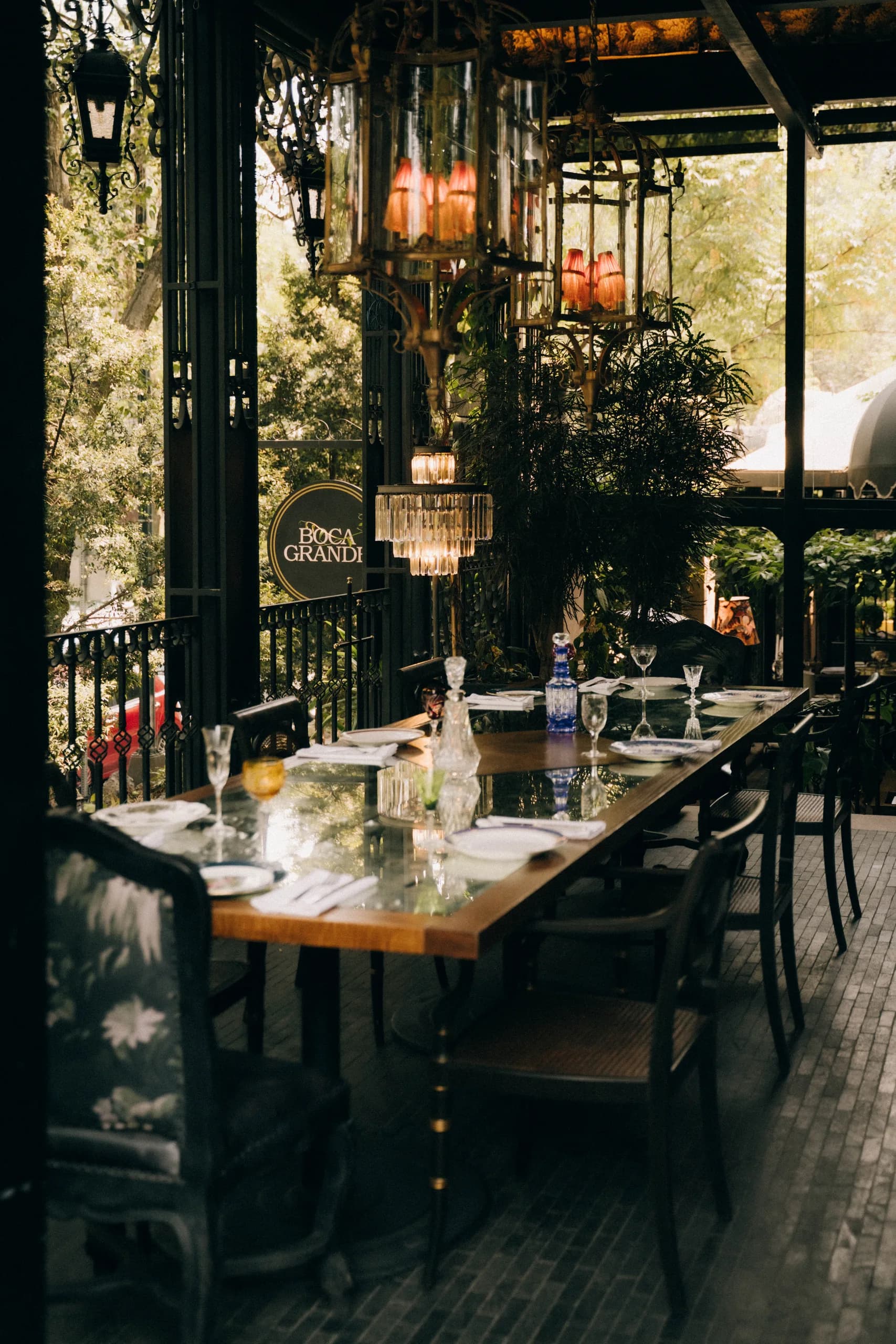 Lantern-lit terrace table set at Boca Grande